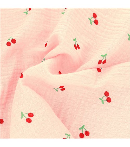 Tissu double gaze imprimée cerise fond rose au mètre