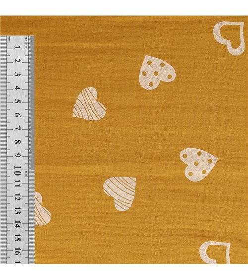 Tissu double gaze imprimée coeurs 130gsm jaune moutarde au mètre