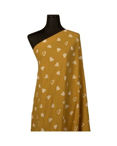 Tissu double gaze imprimée coeurs 130gsm jaune moutarde au mètre