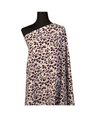 Tissu double gaze imprimée léopard 130gsm leopard fond blanc au mètre