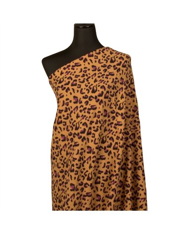 Tissu double gaze imprimée léopard 130gsm leopard fond camel au mètre
