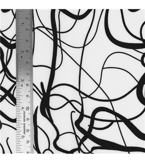 Tissu super soft stretch imprimé arabesques noir et blanc 150cm au mètre