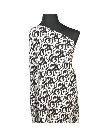Super soft stretch fabric printed with black circles 150cm per meter