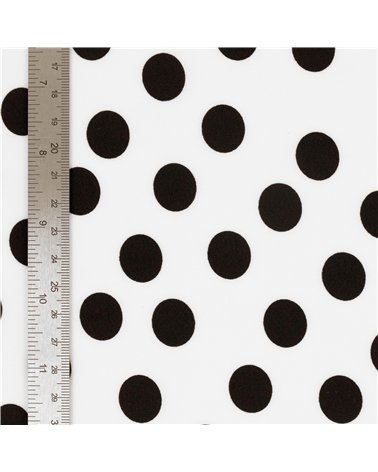 Tessuto elasticizzato super morbido stampato con pois neri su fondo bianco 150 cm al metro