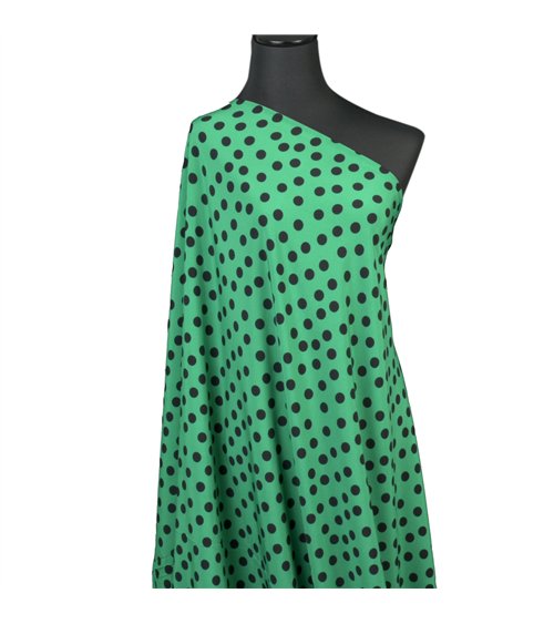 Super soft stretch fabric printed black polka dots on green background 150cm per meter