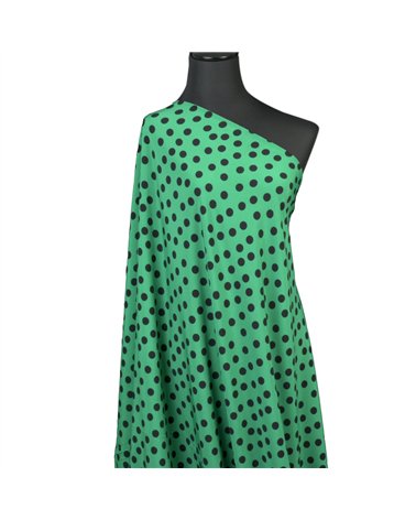 Super soft stretch fabric printed black polka dots on green background 150cm per meter